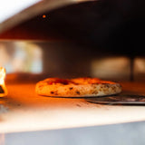Four à pizza Marinara au bois Fontana, pizza dans la chambre de cuisson